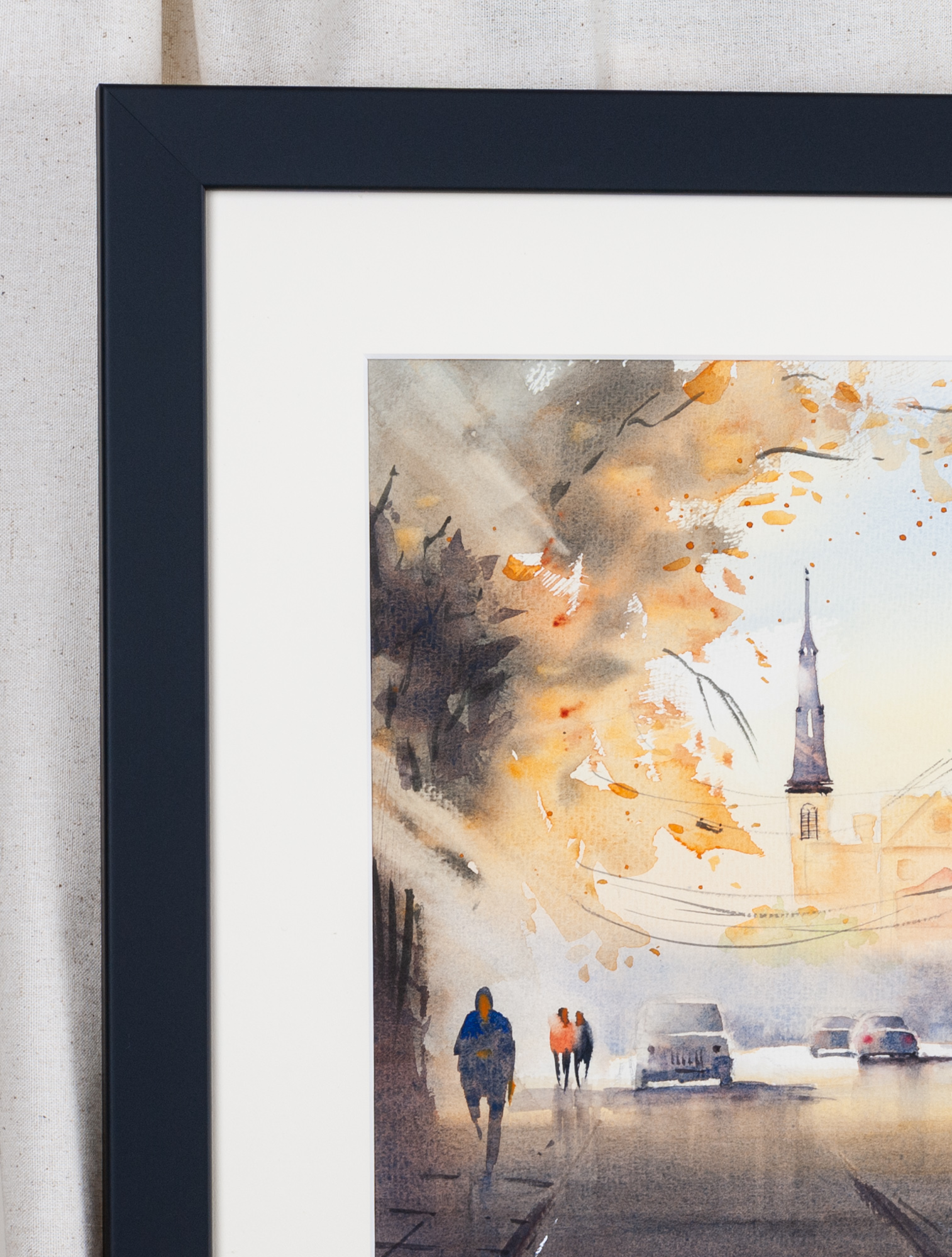 Framed detail of Before the Storm artwork showing Charleston street with church steeple and pedestrians