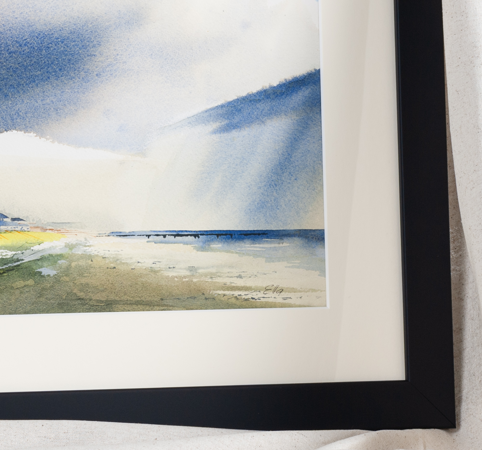 Framed detail of Rain on Folly Charleston artwork highlighting shoreline and dramatic rain-filled sky