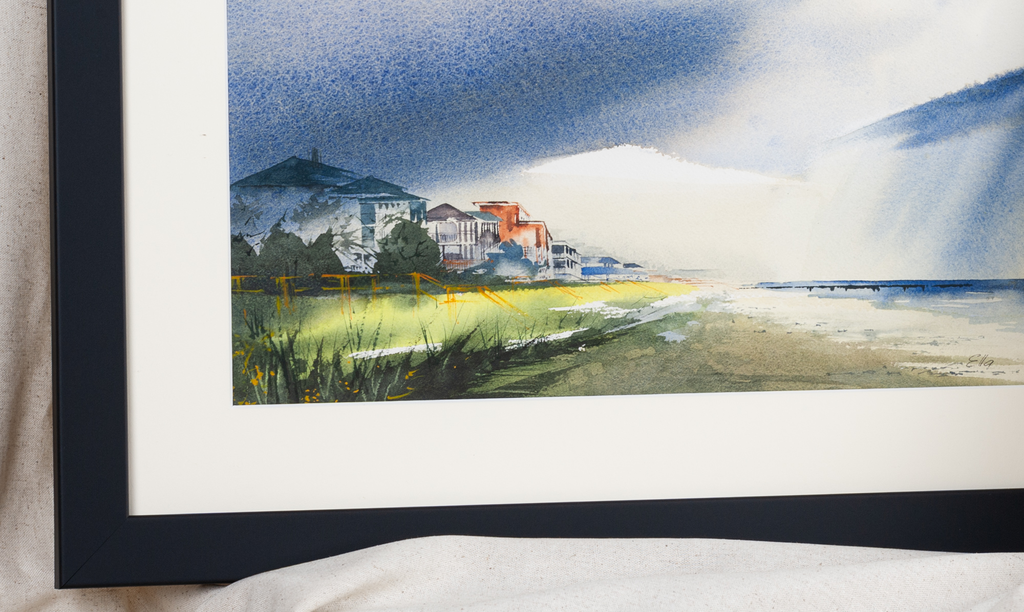 Framed detail of Rain on Folly artwork with Charleston beach houses and ocean horizon