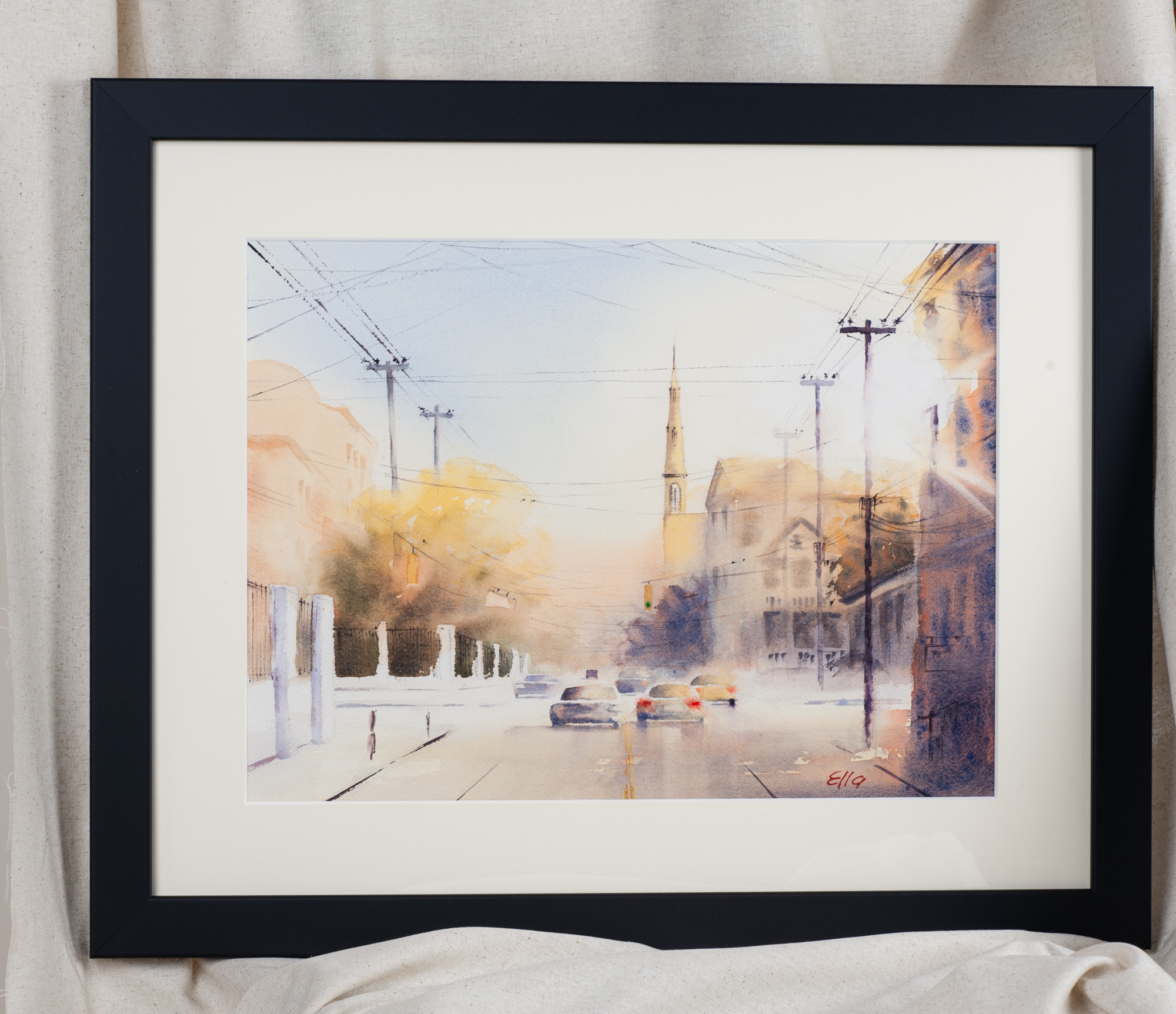 Sun Kissed Charleston artwork of Citadel Square Church displayed in a black frame, elegant wall décor