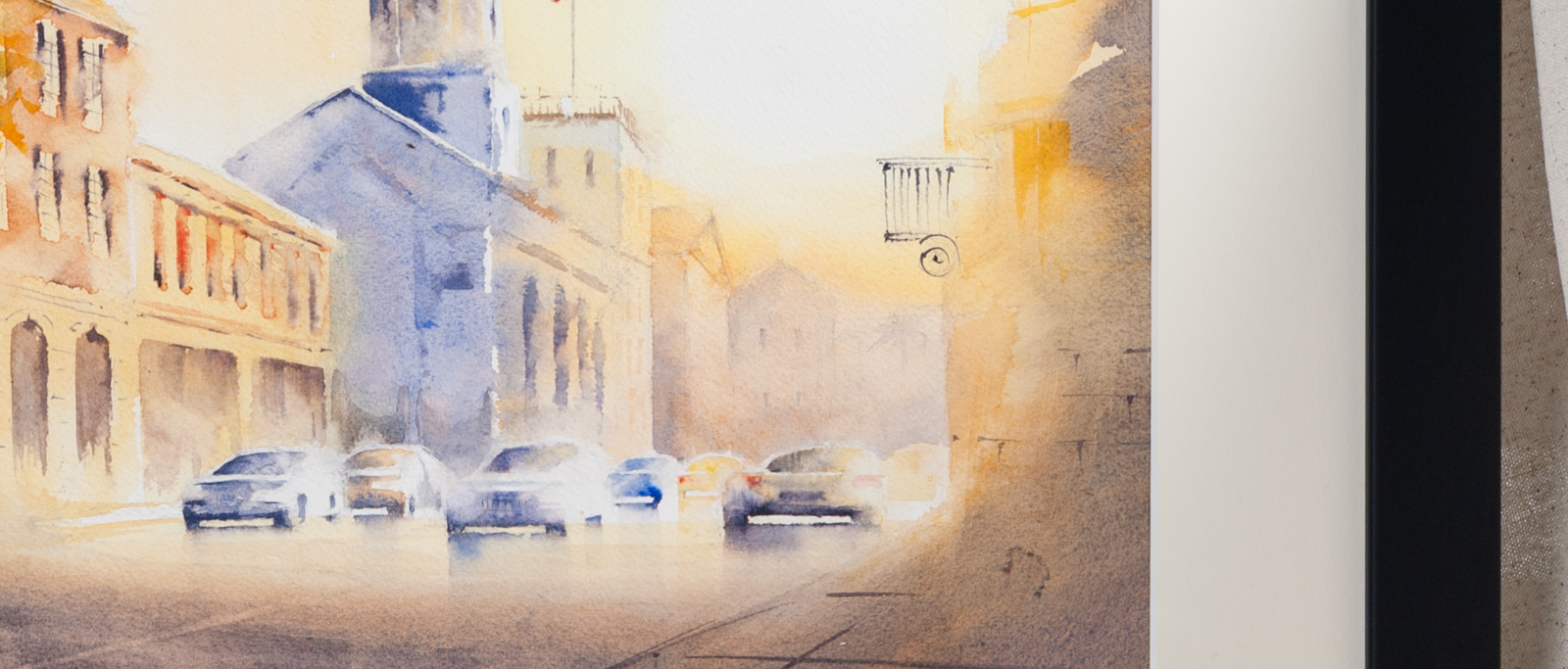 Close-up detail of St. Michael’s Church Charleston artwork with glowing sunset and Broad Street architecture