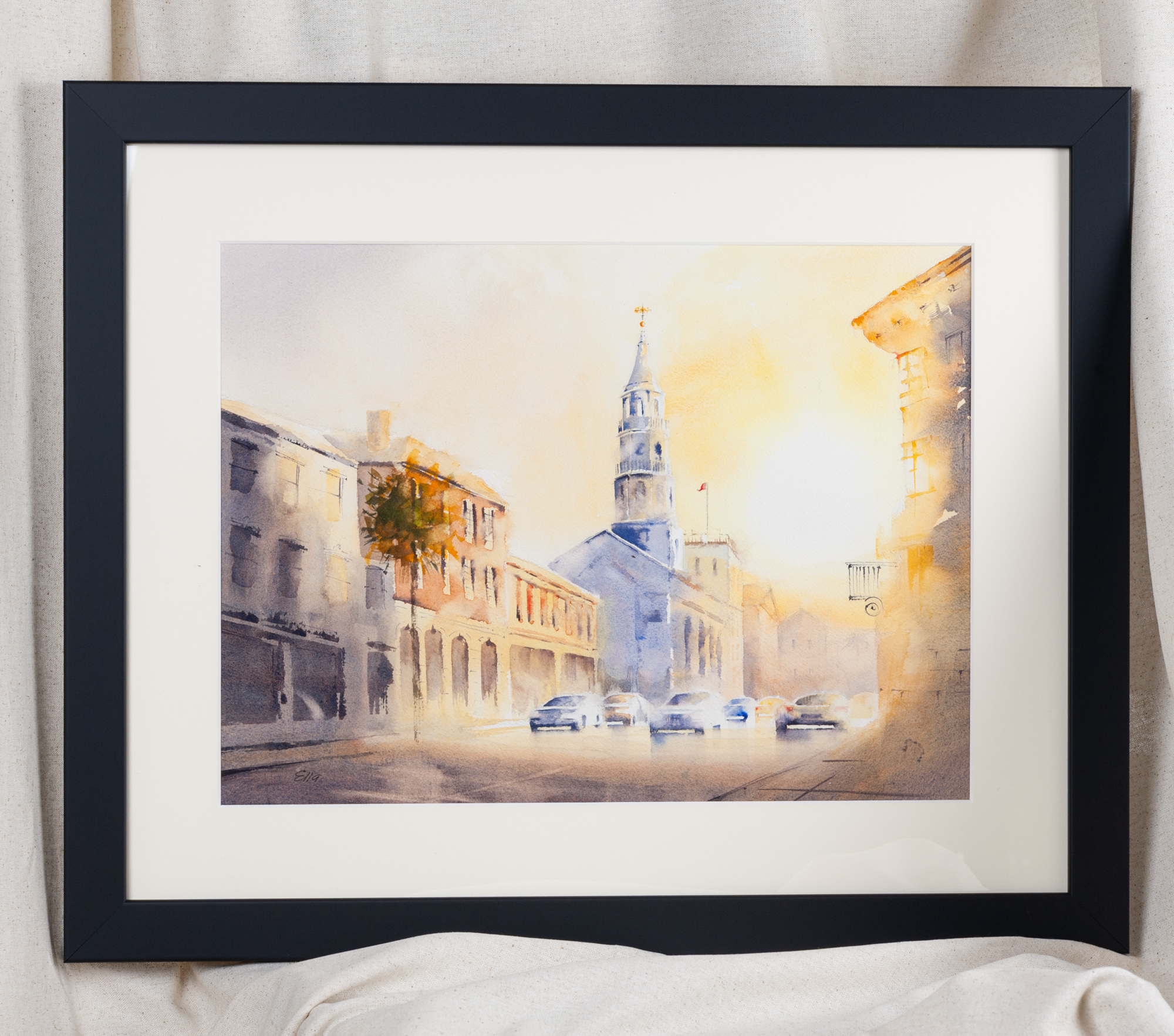 Sunset on Broad Street artwork of St. Michael’s Church displayed in a black frame, elegant wall décor